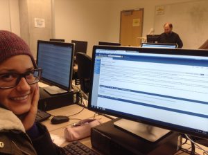 Melissa Peretta learns about editing & creating Wikipedia pages from John Dupuis (background) in a January 2014 Plant Ecology course lab.