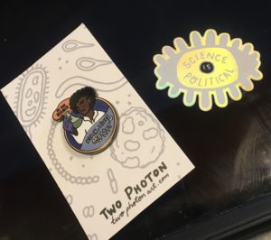 Two Photon Art's Black lives matter pin and science is political sticker